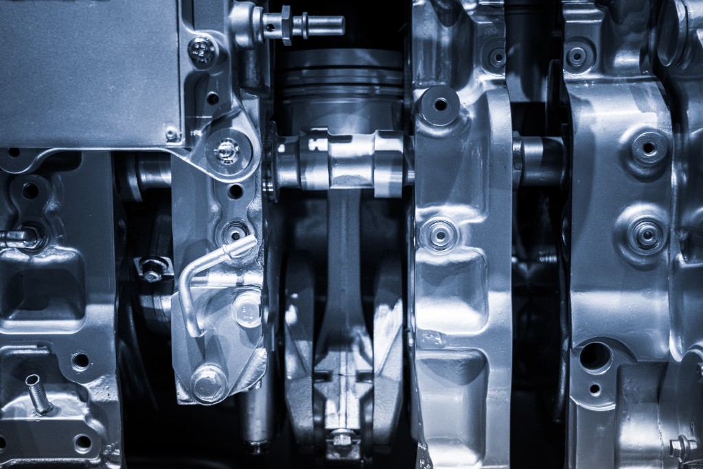 Close view of an engine block and pistons